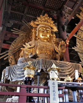 One of two smaller Buddha statues in the Great Buddha Hall in the Tōdai-ji temple complex in Nara, Japan